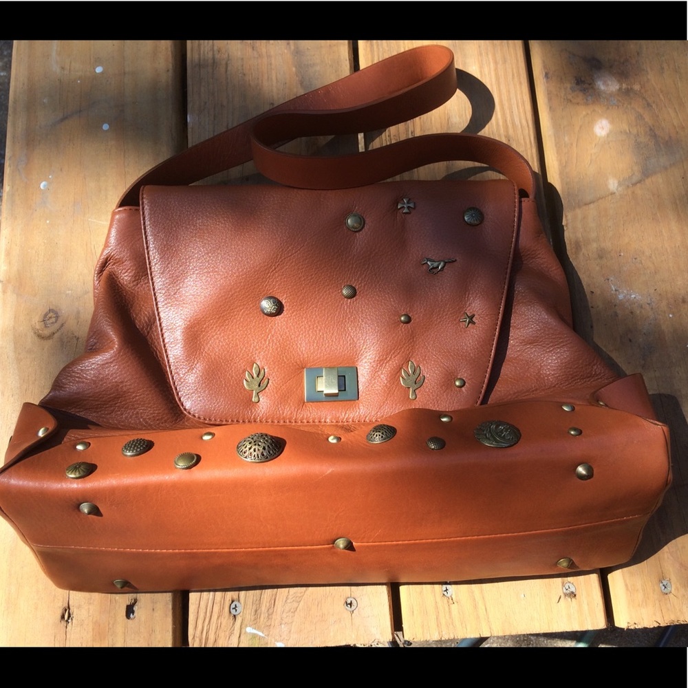 Italian leather satchel with vintage brass accents
